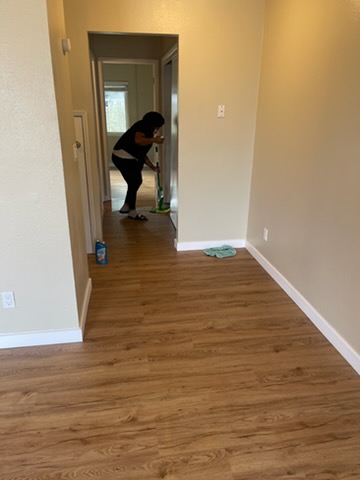 Mopping a hardwood hallway